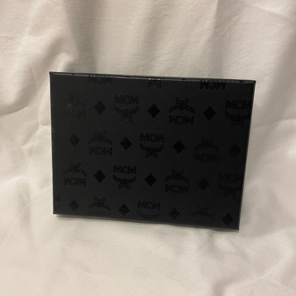 MCM wallet with box in Dad’s bag - Picture 10 of 11